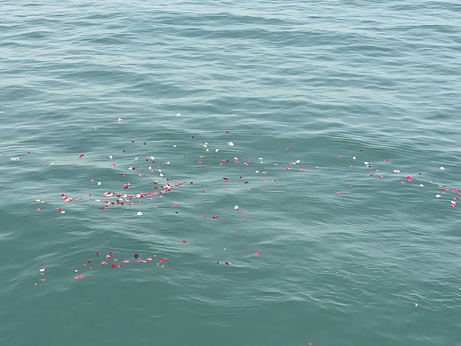 Ash scattering at sea on calm ocean waters in North Carolina